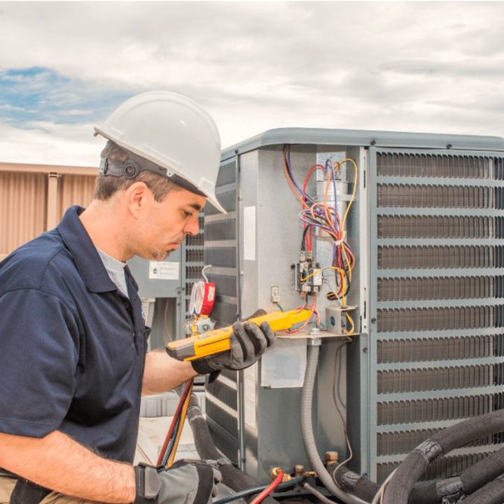 Wasaga Beach Heating & Cooling HVAC technician on a service call in Wasaga Beach, Ontario
